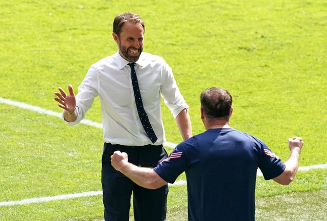 Gareth Southgate celebrates victory over Croatia with coach Steve Holland