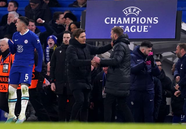 Edin Terzic, centre left, congratulates Graham Potter after Chelsea''s win