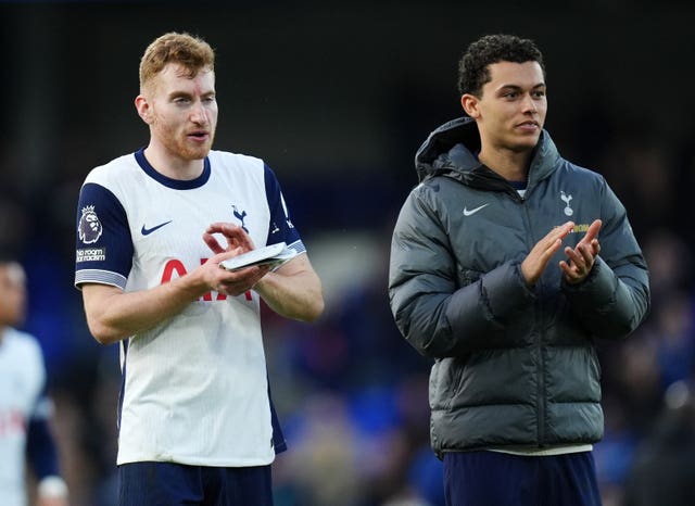 Dejan Kulusevski, left, and Brennan Johnson applaud the Tottenham fans after victory at Ipswich