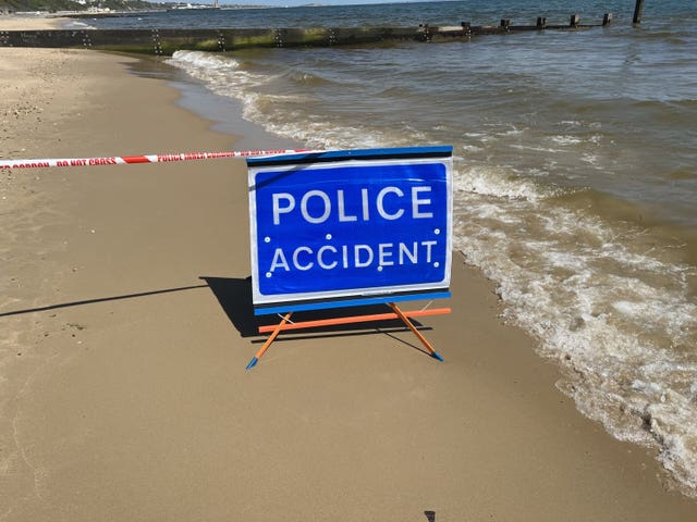 A sign at the scene of the stabbing