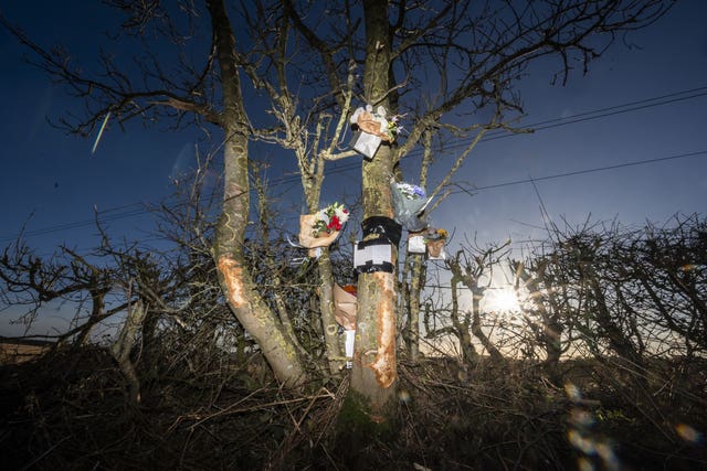 Floral tributes left on Bramley Lane in West Bretton, near Wakefield