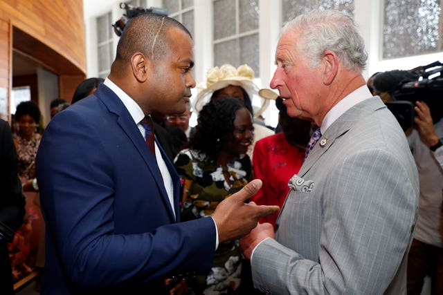 The Prince of Wales talks with Johnson Beharry