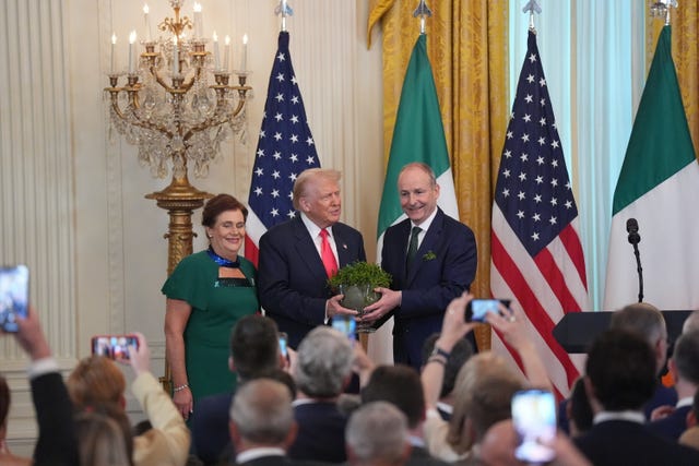 Micheal Martin presents a bowl of shamrock to Donald Trump