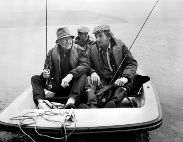 Mr Carter (left), trout fishing with Western Mail fishing expert Moc Morgan on Clywedog Reservoir, near Llanidloes, in Wales in 1986