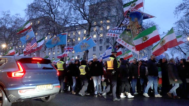 People taking part in a protest in Whitehall, central London, to show solidarity with the protests in Iran