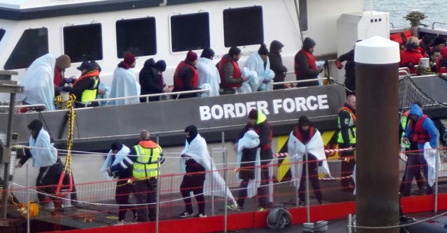 Migrants arriving in Dover on a Border Force vessel