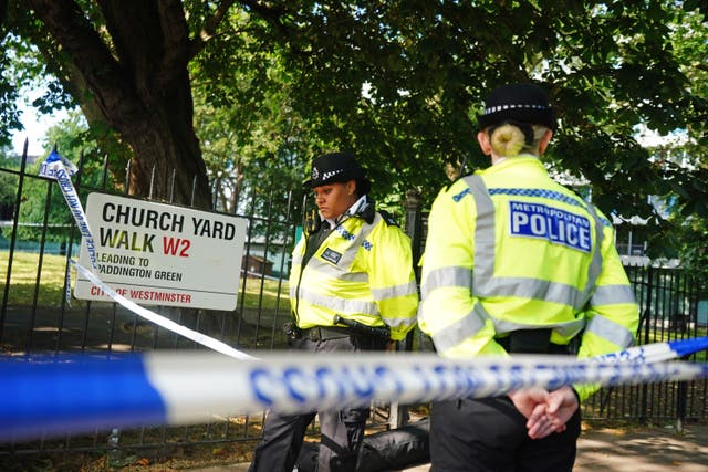 Police officers at the scene (James Manning/PA)