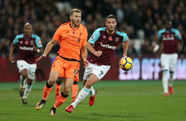 Liverpool and West Ham players battle for the ball Premier League – London Stadium