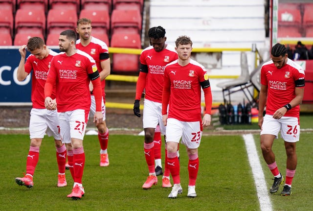 Footballers across the country also wore black armbands, with Swindon among the clubs paying their respects