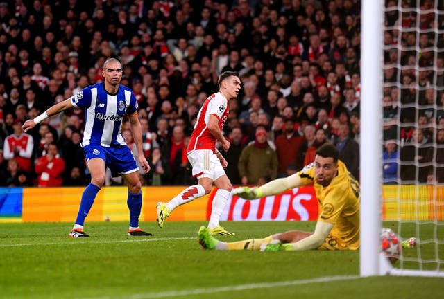 Arsenal's Leandro Trossard, centre, scores against Porto