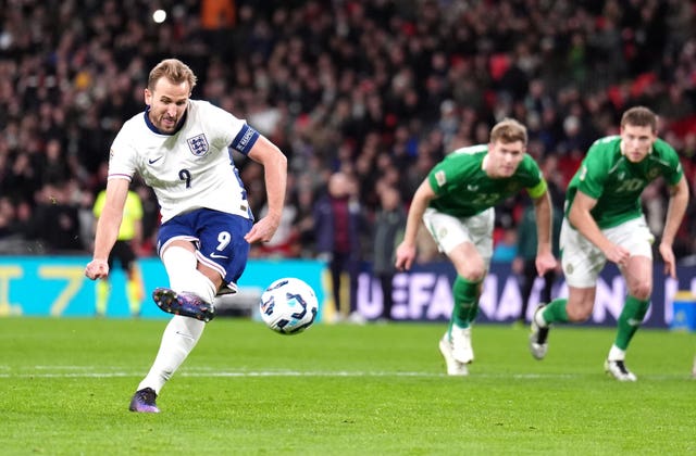 Harry Kane sidefoots the ball with his right foot from the penalty spot at Wembley