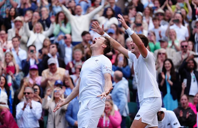 Britain's Henry Patten and his Finnish partner Harri Heliovaara celebrate their doubles success 