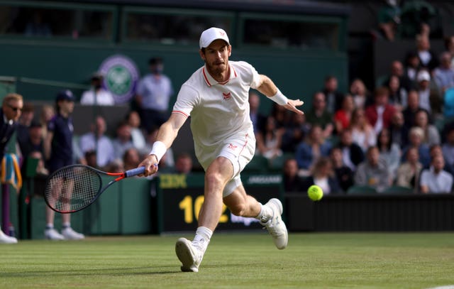 Andy Murray chases a forehand on Centre Court