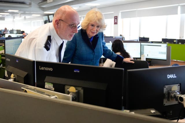 The Queen with dispatcher Ian Le Sueur in the control room 