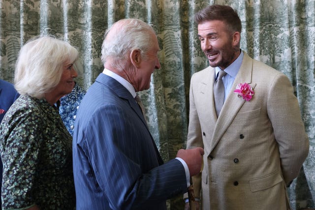 The King and Queen with David Beckham at the Chelsea Flower Show 