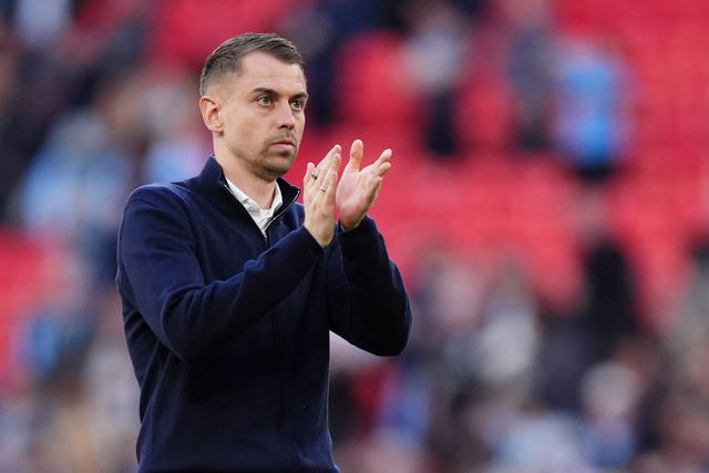 Southampton manager Tonda Eckert applauds the fans