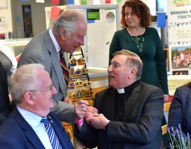 The King and Father Brian D’Arcy
