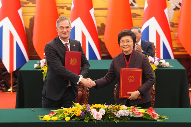 Business Secretary Peter Kyle during a signing ceremony