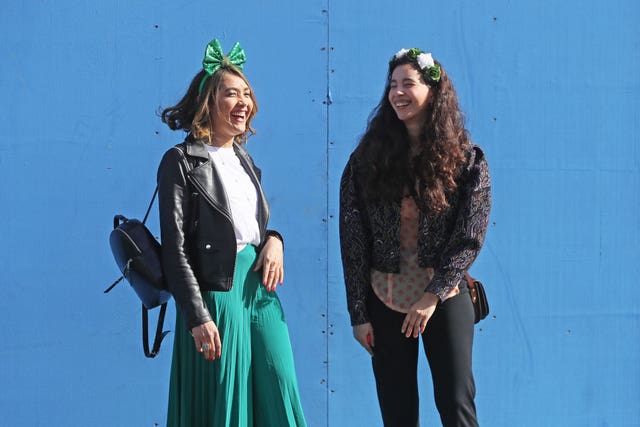 People dressed up to celebrate St Patrick’s Day (Brian Lawless/PA)