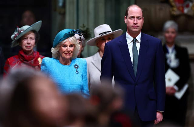 The Queen stands next to the Prince of Wales last year when both the King and Kate missed the service 