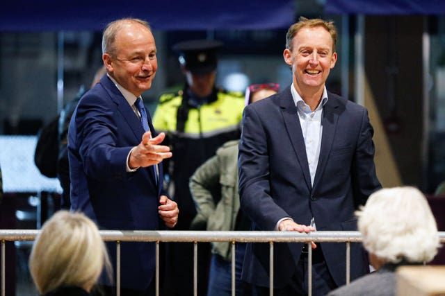 Fianna Fail election candidate Barry Andrews (right) and Tanaiste Micheal Martin at the RDS count centre on Monday