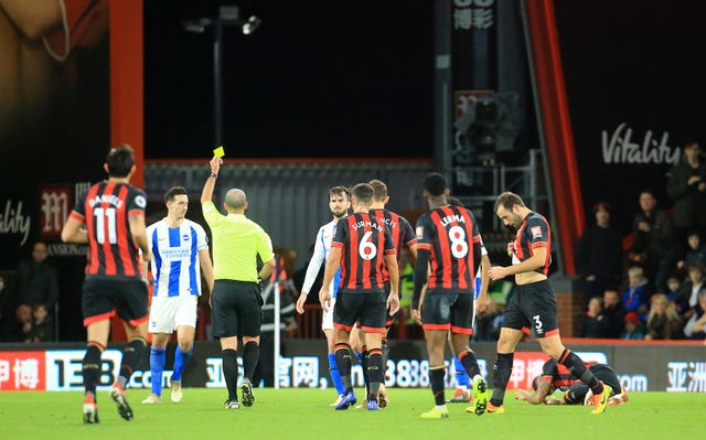Lewis Dunk receives his second yellow card 