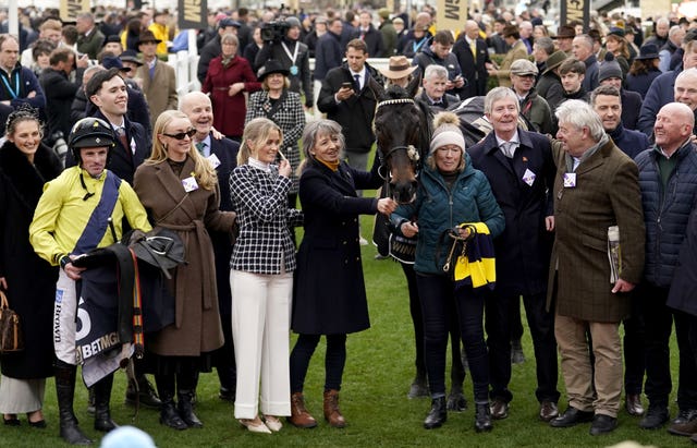 Michael O'Sullivan's girlfriend Charlotte Giles (fourth left) joined the Marine Nationale team in the winner's enclosure