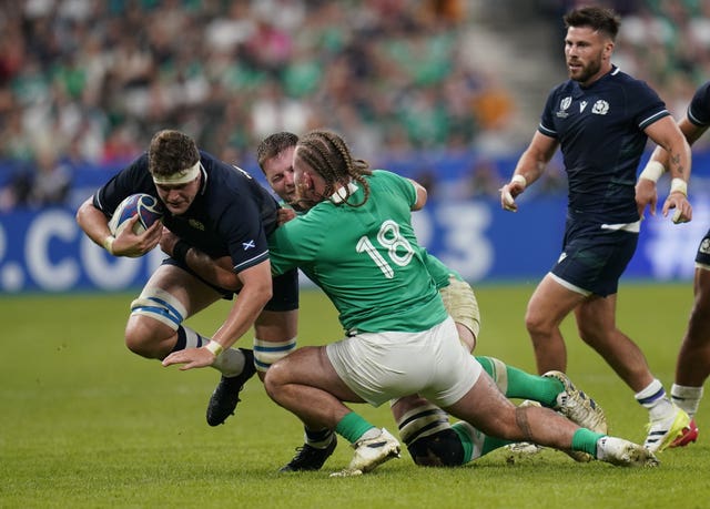 Scotland’s Scott Cummings is tackled by Ireland’s Finlay Bealham at the 2023 Rugby World Cup