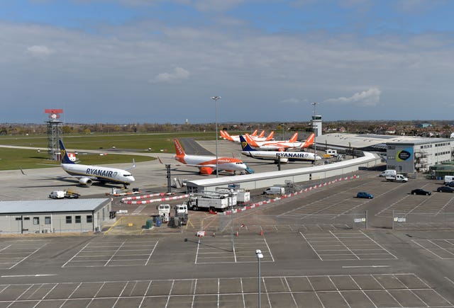 Ryanair and easyJet aircraft parked near to an empty long stay car park at Southend airport (Nick Ansell/PA)