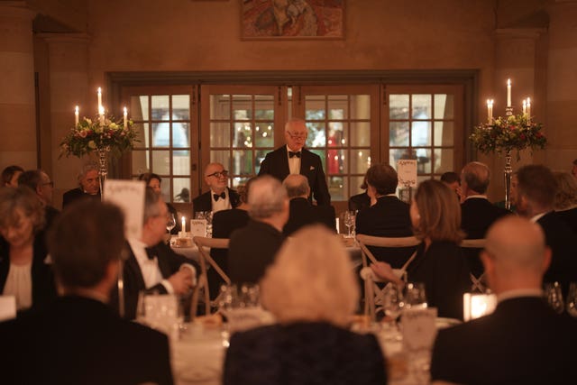 Charles delivers a speech during the celebration dinner