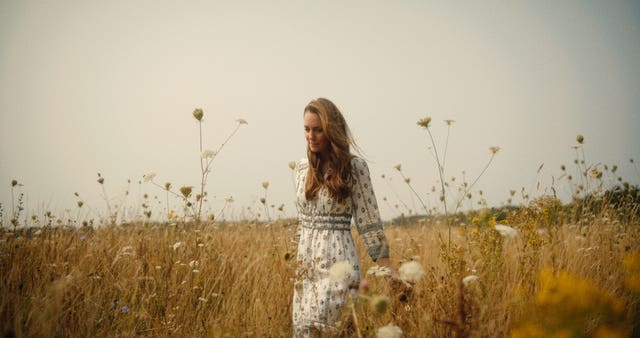 The Princess of Wales walking through a meadow in a video released in September