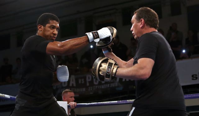 Rob McCracken, right, should be in Joshua's corner if a fight against Fury goes ahead on August 14 (John Walton/PA)