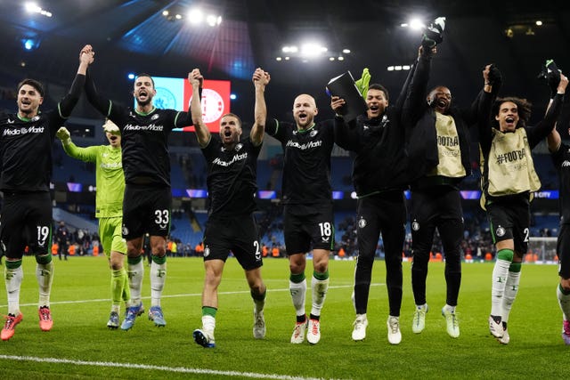 Feyenoord celebrate in front of their fans after coming from 3-0 down to draw with Manchester City