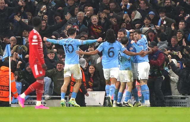 Rodri, second right, celebrates his opening goal with team-mates