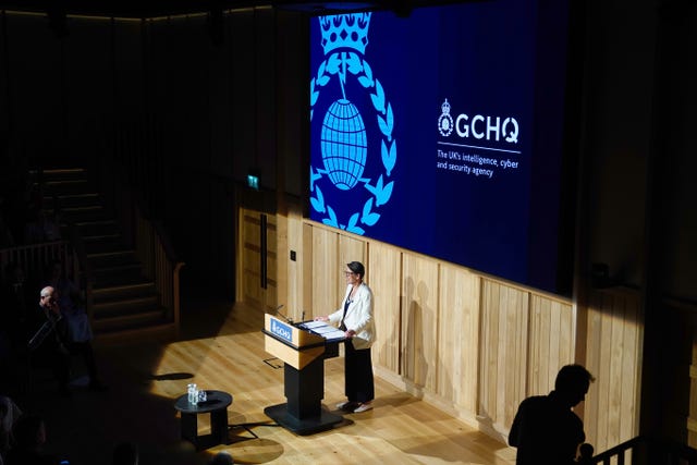 Anne Keast-Butler on stage delivering her lecture