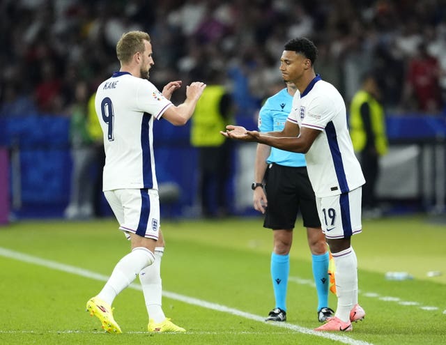 England’s Harry Kane (left) is replaced by substitute Ollie Watkins just after the hour-mark of the Euro 2024 final