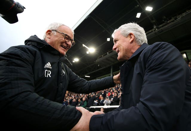 Claudio Ranieri (left) is greeted by Southampton manager Mark Hughes 