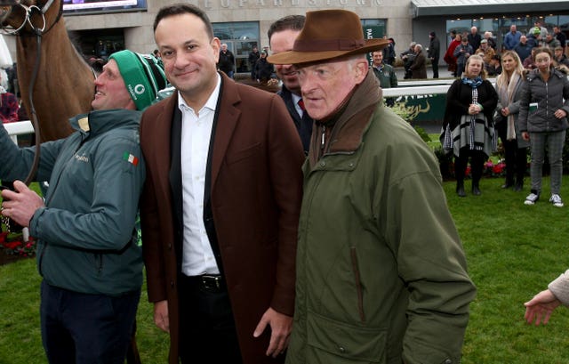 Taoiseach Leo Varadkar with trainer Willie Mullins, who enjoyed a six-timer 