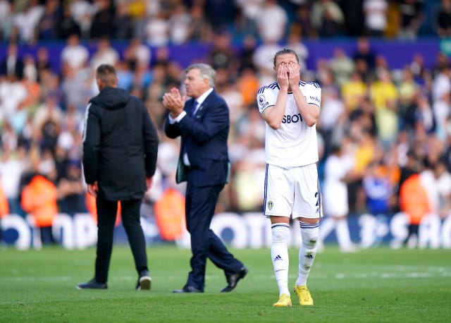 Leeds’ Luke Ayling appears dejected after the club were relegated on Sunday (Tim Goode/PA)