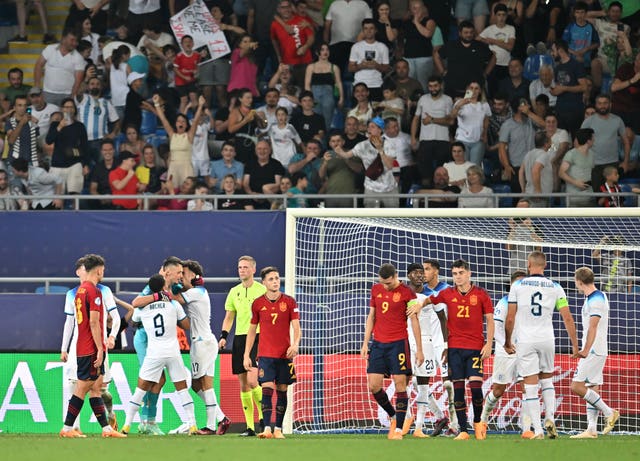 England goalkeeper James Trafford is congratulated following his penalty save
