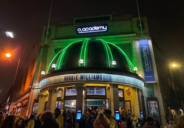 People queue at O2 Academy Brixton in London 