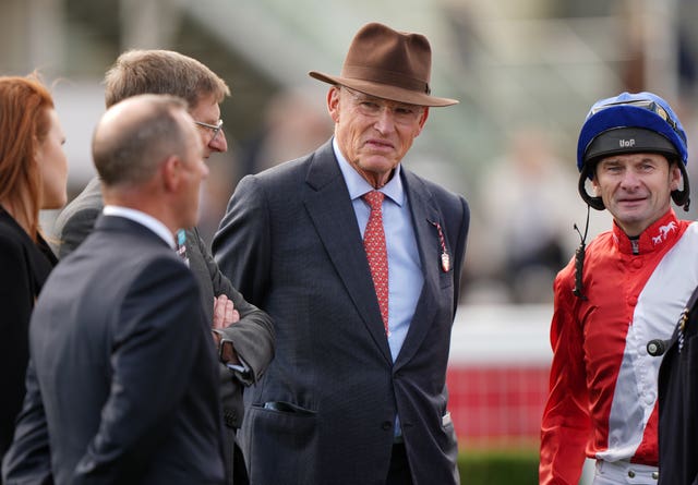 John Gosden with the Cheveley Park Stud team at Newmarket