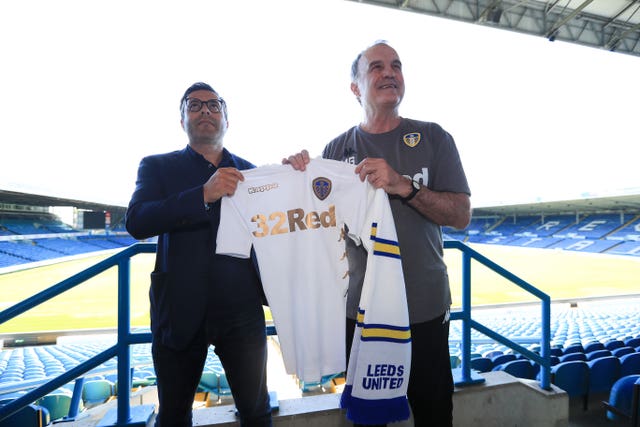 Leeds owner Andrea Radrizzani, left, welcomes Marcelo Bielsa to Elland Road