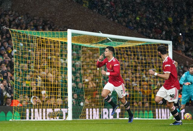 Manchester United’s Cristiano Ronaldo (left) celebrates scoring at Carrow Road