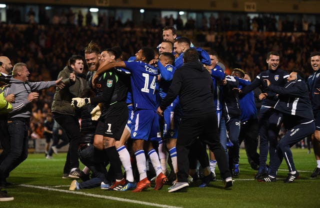 Colchester fans invaded the pitch after their side's win against Tottenham