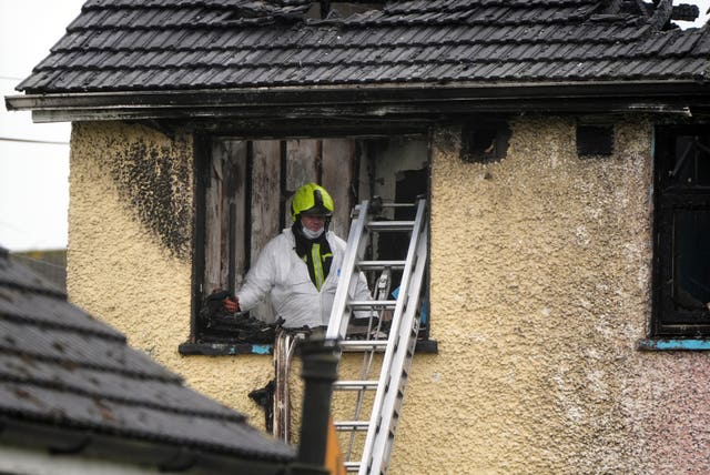 A member of the Garda technical bureau conducts a forensic investigation at a property in Castleview Park in Edenderry, Co Offaly