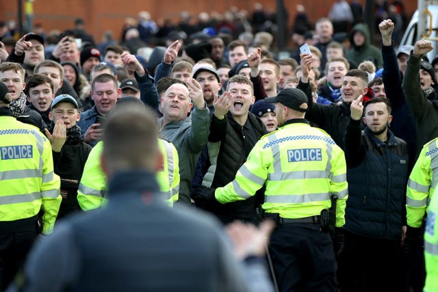 Police surround fans ahead of the match between Birmingham and Aston Villa