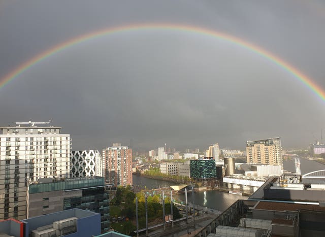 A rainbow appearing over MediaCityUK in Salford, Greater Manchester, prior to the applause to salute local heroes during Thursday’s nationwide Clap for Carers 