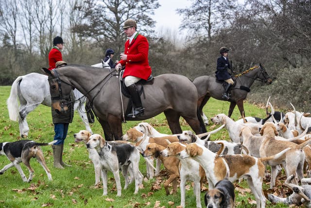 Riders and hounds during the Tedworth Hunt’s Boxing Day meet in Pewsey, Wiltshire