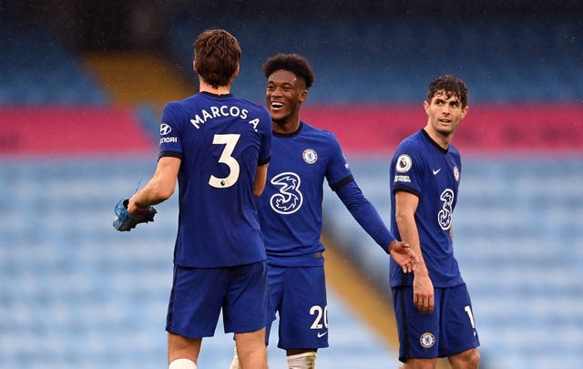 Marcos Alonso (left) celebrates his winner